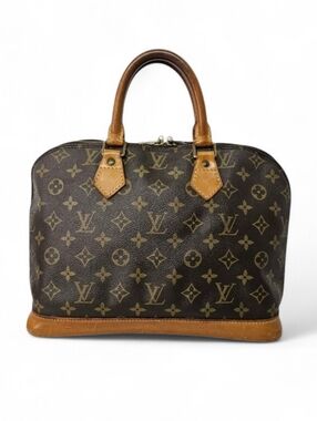 Louis Vuitton Alma PM Handbag in Monogram Canvas and Leather in Brown